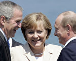 德国总理梅克尔(中)在会后宣布，各国在对抗温室效应上达成重大共识//AFP/Getty Images