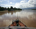 環保人士警告，中國在西南地區攔河築壩及過度的開發已打亂河流生態，威脅魚群的生存空間。(FREDERIC J. BROWN/AFP/Getty Images)