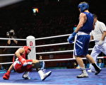北京奧運輕重量級的(81 公斤) 拳擊比賽，8月14 日，阿爾及利亞的選手Abdelhafid Benchabla（右）與埃及選手的Ramadan Yasser 對戰。(Getty)