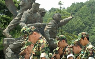 韩国各地举行纪念南北韩战争59周年活动　