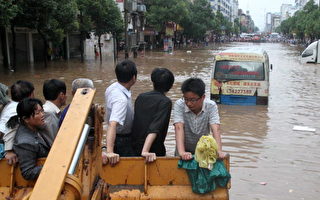 中国十数省暴雨死亡增至175 损失20亿美金