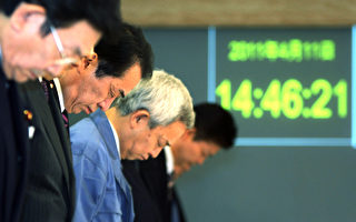 组图：日本震灾届满一个月 举国哀悼