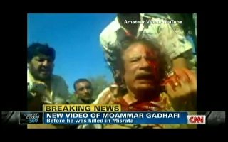 俄专家宣称：卡扎菲还活着 死者是替身