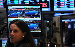 美国股市升至五年高点 冲破一万四大关