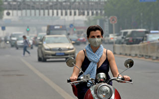 北京遭霧霾高溫襲擊 全城昏黃再現嚴重污染