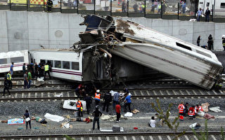 组图：40年来最惨 西班牙列车出轨77死逾百伤