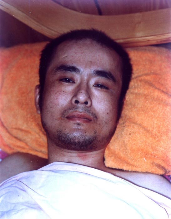 被迫害成高位截癱的曲輝 被迫害成高位截癱的曲輝