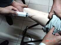 北京夫妇屡遭当局迫害 下肢瘫痪再临非法审判