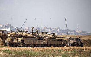 以色列在加沙边境布阵 空袭巴解据点
