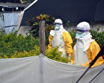 醫生無疆界組織的工作人員在非常進行防疫工作。(AFP PHOTO / CELLOU BINANI)