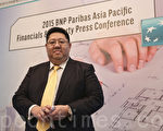 法国巴黎银行董事总经理李伟烈表示,预计2015年大陆会有两次25个点子的对称减息以及三次降准。(余钢/大纪元)