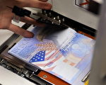 美国务院将取消护照加页
