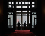 BEIJING, CHINA - MARCH 07: Soldiers dressed as ushers perform guard duties during the a plenary session of the Chinese People's Political Consultative Conference on March 7, 2013 in Beijing, China. Clearing urban air pollution has become a big concern during the Chinese People's Political Consultative Conference. Over 2,000 members of the 12th National Committee of the Chinese People's Political Consultative, a political advisory body, are attending the annual session, during which they will discuss the development of China. (Photo by Lintao Zhang/Getty Images)