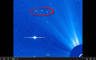 NASA照片显示巨型UFO编队飞过太阳