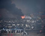 爆炸附近现场仍有浓烟冒出。   (STR/AFP/Getty Images)