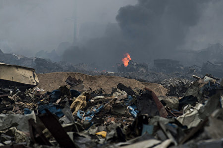 圖為天津大爆炸事故現場。（FRED DUFOUR/AFP）