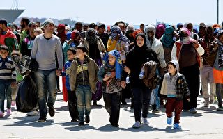 德稱每年收容50萬難民 60國代表聚巴黎解危機