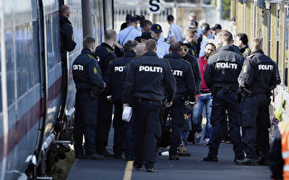 难民潮北上 丹麦停驶往返德国列车封锁公路