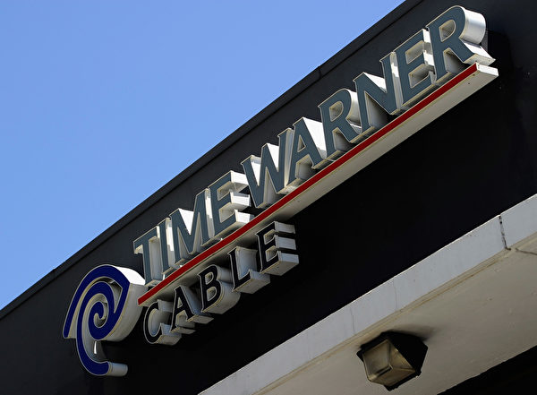 2000年美国在线(AOL)以1,620亿美元买下时代华纳(Time Warner),完成了史上最大笔的交易。(Kevork Djansezian/Getty Images) 2000年美国在线(AOL)以1,620亿美元买下时代华纳(Time Warner),完成了史上最大笔的交易。(Kevork Djansezian/Getty Images)