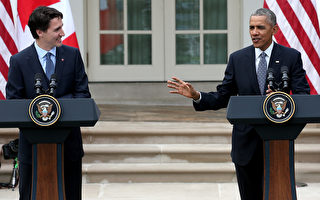 组图：奥巴马迎加拿大总理 笑谈双边关系