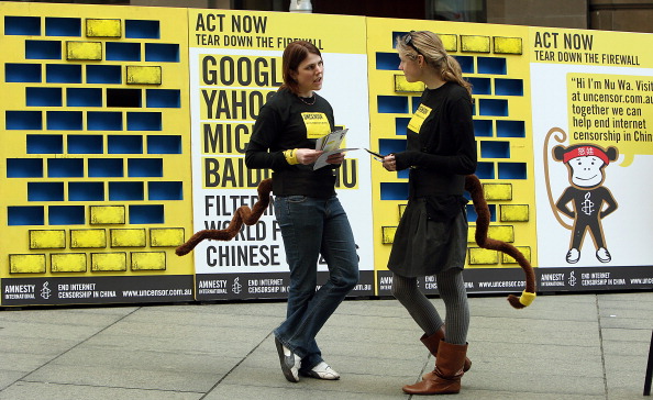 国际特赦成员2008年在悉尼举行活动，要求中共停止互联网审查。（GREG WOOD/AFP/Getty Images)