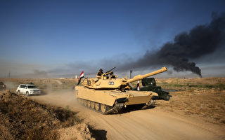 伊拉克进攻IS手中战略重镇 美军空袭掩护