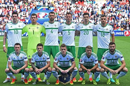 Northern Ireland's starting eleven pose for a group picture during the Euro 2016 round of sixteen football match Wales vs Northern Ireland, on June 25, 2016 at the Parc des Princes stadium in Paris. / AFP / PAUL ELLIS (Photo credit should read PAUL ELLIS/AFP/Getty Images)