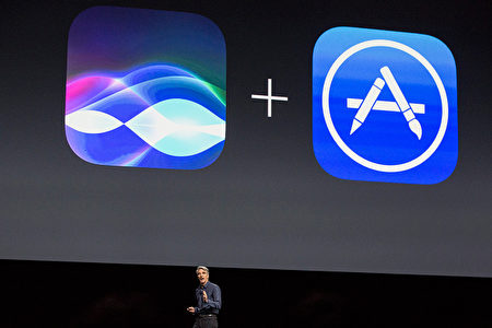 苹果Siri功能将与WatchOS、tvOS、 MacOS以及iOS连接。( Andrew Burton/Getty Images)