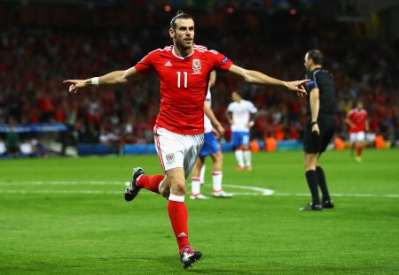 TOULOUSE, FRANCE - JUNE 20: Gareth Bale of Wales celebrates scoring his team's third goal during the UEFA EURO 2016 Group B match between Russia and Wales at Stadium Municipal on June 20, 2016 in Toulouse, France. (Photo by Dean Mouhtaropoulos/Getty Images)