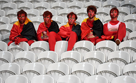 LILLE, FRANCE - JULY 01: Dejected Belgium supporters are seen after the UEFA EURO 2016 quarter final match between Wales and Belgium at Stade Pierre-Mauroy on July 1, 2016 in Lille, France. (Photo by Michael Regan/Getty Images)