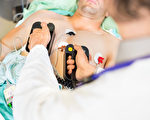 (Image of defibrillator paddles via Shutterstock)