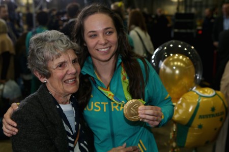 SYDNEY, AUSTRALIA - AUGUST 24: Chloe Dalton is greeted by family members during the Welcome Home for Australian Olympic Games athletes at Sydney International Airport on August 24, 2016 in Sydney, Australia. (Photo by Jason McCawley/Getty Images)