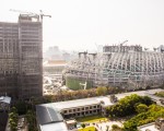 遠雄大巨蛋遭控施工不當,造成松山菸廠煙囪傾斜、地基下陷,台北地方法院14日判賠75萬8,417元。(陳柏州/大紀元)
