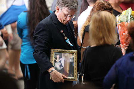 NEW YORK, NY - SEPTEMBER 11: People attend a commemoration ceremony for the victims of the September 11 terrorist attacks at the National September 11 Memorial and Museum fifteen years after the day on September 11, 2016 in New York City. Throughout the country services are being held to remember the 2,977 people who were killed in New York, the Pentagon and in a field in rural Pennsylvania. (Photo by Spencer Platt/Getty Images)