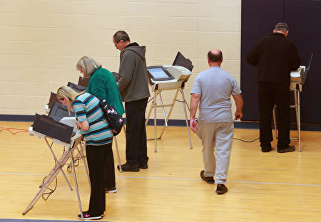 PROVO, UT - NOVEMBER 08: People cast their ballot in the presidential election at Freedom Academy elementary school on November 8, 2016 in Provo, Utah. Americans across the nation are picking their choice for the next president of the United States. (Photo by George Frey/Getty Images)