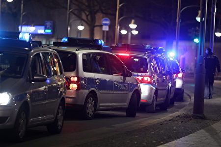 BERLIN, GERMANY - DECEMBER 19: Police cars line up the area after a lorry truck ploughed through a Christmas market on December 19, 2016 in Berlin, Germany. Several people have died while dozens have been injured as police investigate the attack at a market outside the Kaiser Wilhelm Memorial Church on the Kurfuerstendamm and whether it is linked to a terrorist plot. (Photo by Sean Gallup/Getty Images)