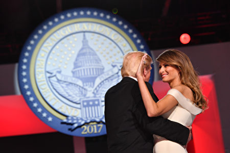 WASHINGTON, DC - JANUARY 20: President Donald Trump and First Lady Melania Trump dance at the Freedom Ball on January 20, 2017 in Washington, D.C. Trump will attend a series of balls to cap his Inauguration day. (Photo by Kevin Dietsch - Pool/Getty Images)