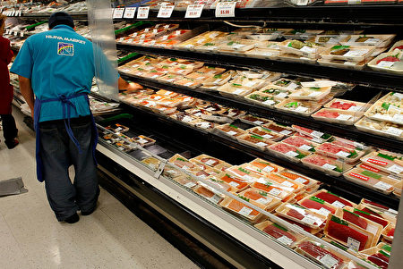SAN FRANCISCO - JANUARY 23: A worker at the Nijiya Market stocks cooler shelves with fresh sashimi January 23, 2008 in San Francisco, California. According to a newspaper report, a new study found that samples of bluefin tuna sashimi contained high levels of mercury in several New York City restaurants. (Photo by Justin Sullivan/Getty Images)