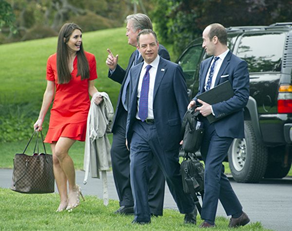 WASHINGTON, DC - APRIL 29: From left to right: Hope Hicks, White House Director of Strategic Communications, Steve Bannon, Chief Strategist, White House Chief of Staff Reince Priebus, and White House Policy Advisor Stephen Miller walk across the South Lawn of the White House to join President Donald Trump aboard Marine One as he departs the White House in Washington, DC en route to Harrisburg, Pennsylvania where he will participate in a Make America Great Again Rally on Saturday, April 29, 2017. (Photo by Ron Sachs - Pool/Getty Images)
