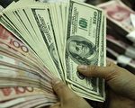 企业囤积美元逼人民币贬值 北京陷恶性循环