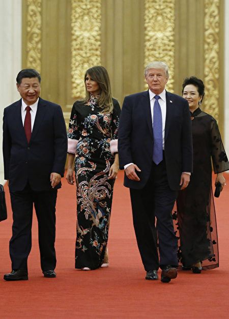 BEIJING, CHINA - NOVEMBER 9: U.S. President Donald Trump and first lady Melania arrive for the state dinner with China's President Xi Jinping and China's first lady Peng Liyuan at the Great Hall of the People on November 9, 2017 in Beijing, China. Trump is on a 10-day trip to Asia. (Photo by Thomas Peter - Pool/Getty Images)