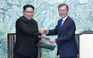 文金会签署“板门店宣言” 允今年内结束韩战