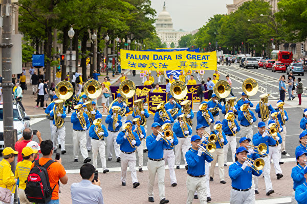 6月20日，全球部分法輪功學員聚集在美國首府華盛頓DC，舉行反迫害集會遊行。（Mark Zou/大紀元）