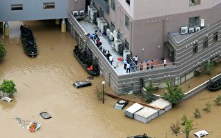 日本暴雨已致逾百人死亡 安倍取消外访