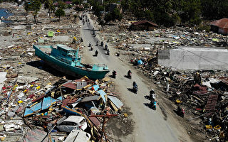強震中捨身救人 印尼追悼機場調度員阿貢