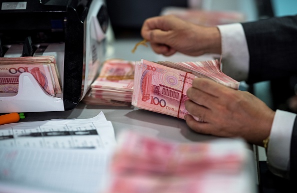 中國人民銀行高級官員3月18日表示，中國金融業的「灰犀牛」風險正在上升。（Johannes Eisele/AFP/ Getty Images）