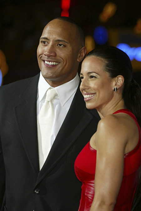 LOS ANGELES - SEPTEMBER 22: Actor Dwayne "The Rock" Johnson and his wife Dany Garcia arrive at the premiere of "The Rundown" at the Universal Amphitheatre on September 22, 2003 in Los Angeles, California. (Photo by Kevin Winter/Getty Images)