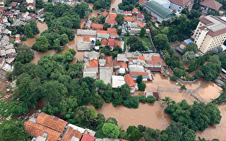 7年来最严重洪灾酿43死 印尼启用人工阻雨