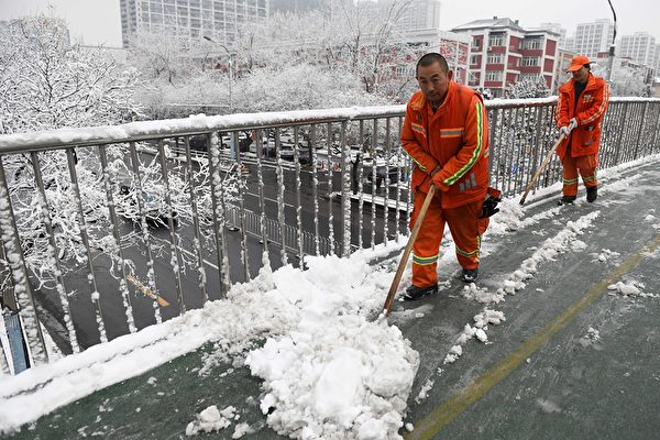 1月6日，北京降雪情況。（GREG BAKER/AFP via Getty Images）