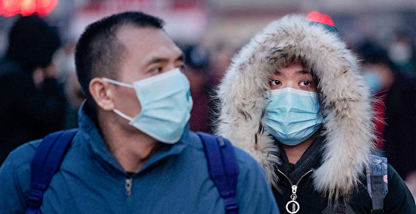 武汉肺癌疫情的病例，为何从1月19日开始激增？(Kevin Frayer/Getty Images)